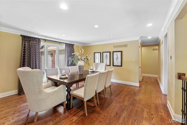 Dining area featuring recessed lighting, wood finished floors, and ornamental molding | Image 12