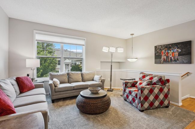 9' Ceilings throughout. Upgraded Light Fixtures and Window Treatments, Fresh Paint Throughout. | Image 6