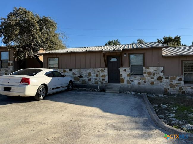Each apartment has own entrance and back patio. Another view of apartment community. | Image 8