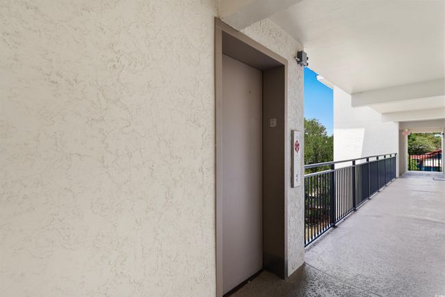 Balcony featuring elevator | Image 26