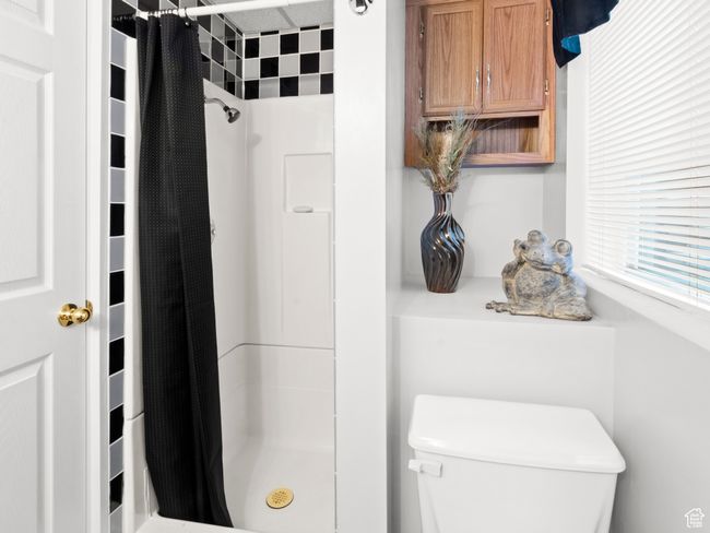 Bathroom featuring a stall shower | Image 15