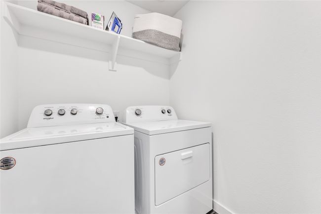 Washroom with laundry area and washing machine and dryer | Image 26