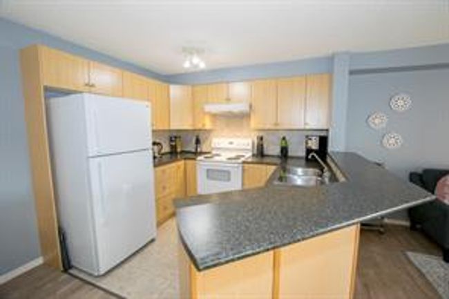 4211 - 60 Panatella St Nw, Condo with 2 bedrooms, 1 bathrooms and 1 parking in Calgary AB | Image 8