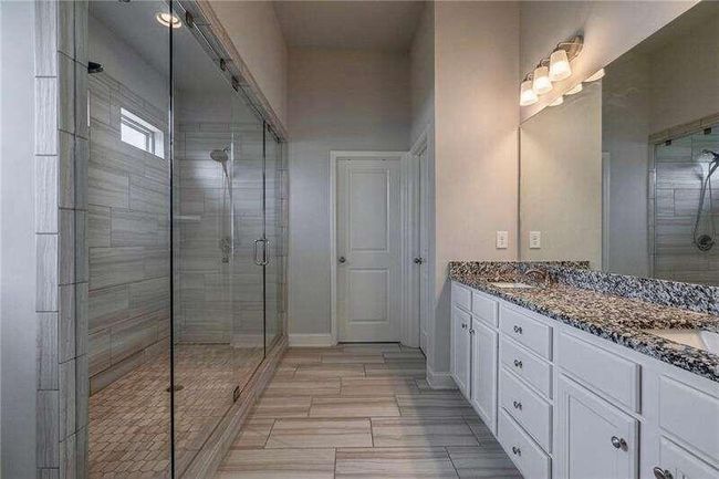 7059 Lancaster Xing, House other with 4 bedrooms, 3 bathrooms and 3 parking in Flowery Branch GA | Image 25