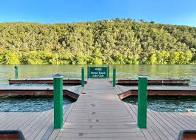 Dock area featuring a view of trees and a water view | Image 32