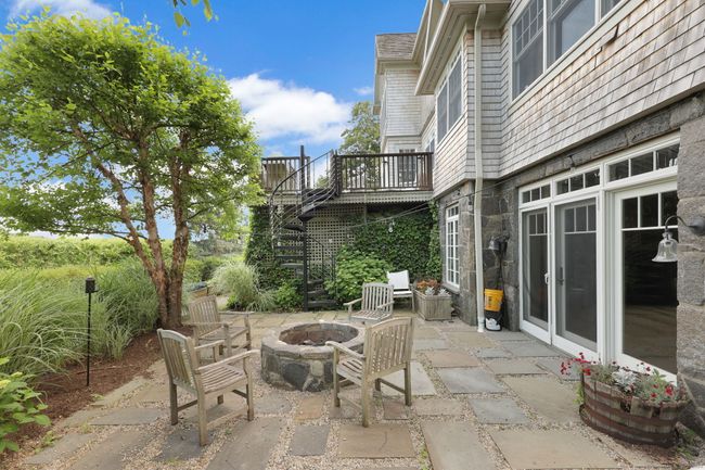 Fire pit with spiral stairs to deck. | Image 27