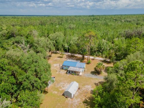 15265 Country Club Boulevard, FORT MC COY, FL, 32134 | Card Image