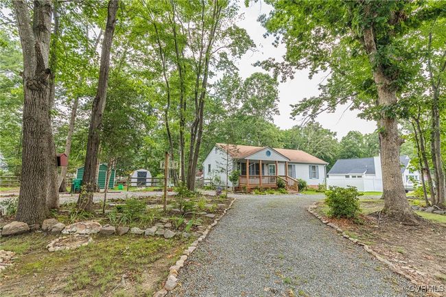 Bungalow-style home featuring driveway and a porch | Image 50