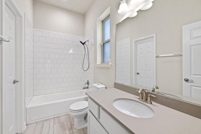 Full bathroom with vanity and shower / tub combination | Image 24