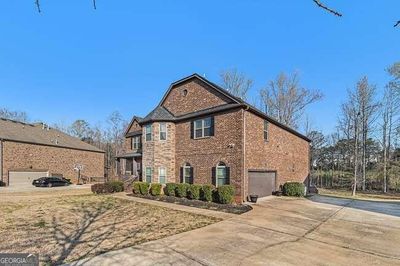 2214 Golden Eagle Drive, House other with 5 bedrooms, 4 bathrooms and 2 parking in Locust Grove GA | Image 3