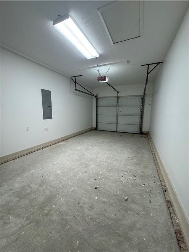 Single car garage but could be enclosed easily and the HVAC unit was installed to add this space. | Image 10