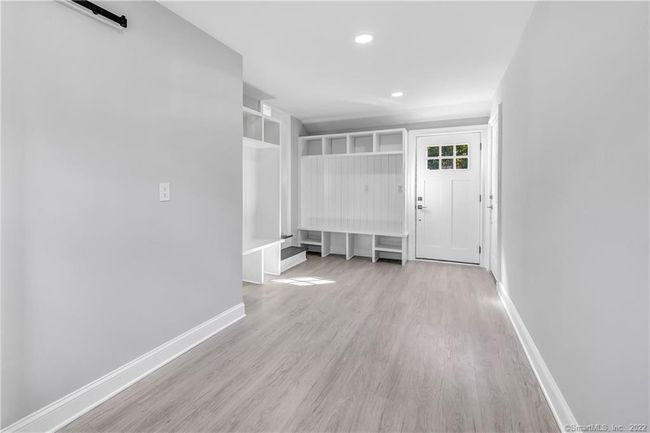 Newly added s.f. offers a separate coat closet/pantry. | Image 7