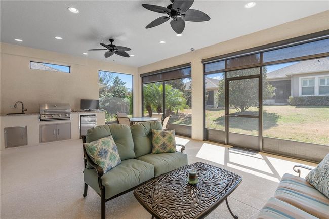 Extended Under Roof Lanai with an Outdoor Kitchen | Image 28