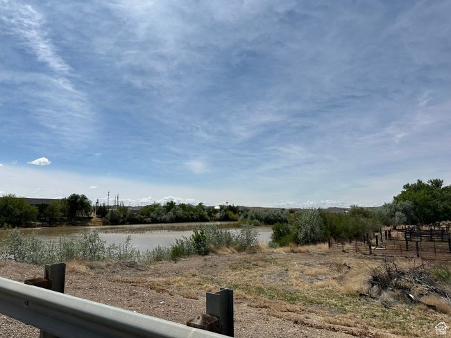 View of yard with a water view | Image 5