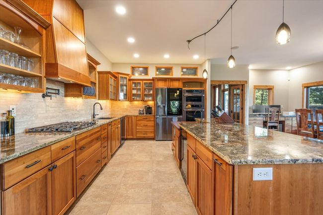 31 Bridle Bit Loop, House other with 6 bedrooms, 5 bathrooms and null parking in Clancy MT | Image 13