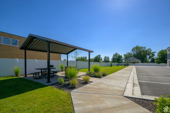 View of home's community featuring a fenced backyard, a patio area, and a yard | Image 20