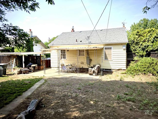Back of house with a patio and a chimney | Image 17