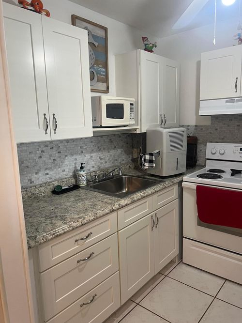 132 Berkshire F, West Palm Beach, FL, 33417-2140 | Card Image