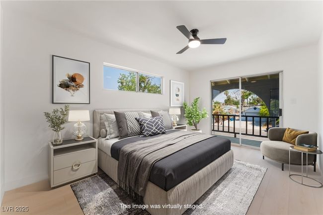 Bedroom with access to outside, light wood-style floors, and ceiling fan | Image 26