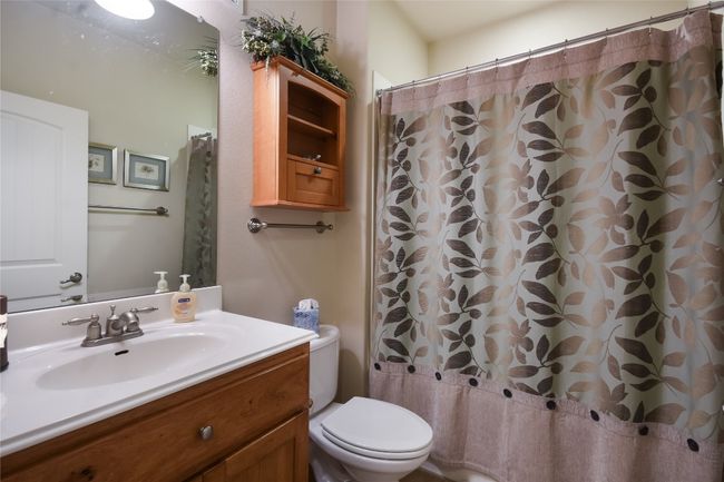 Full Guest bath in hallway | Image 18