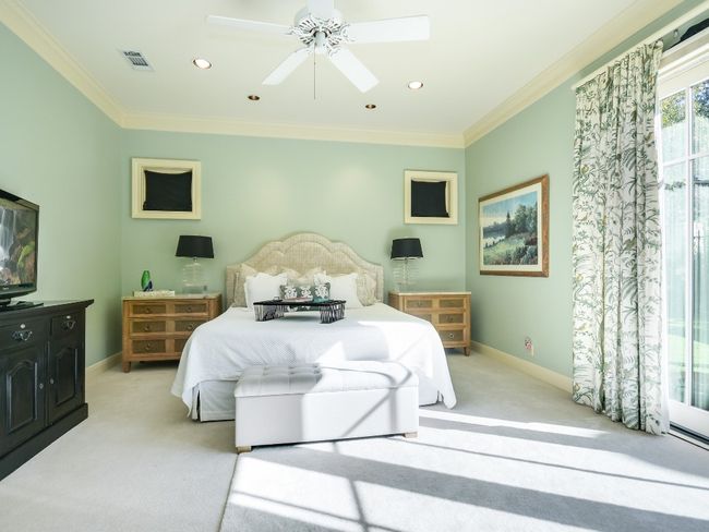 Bedroom with light carpet, baseboards, ornamental molding, recessed lighting, and a ceiling fan | Image 12