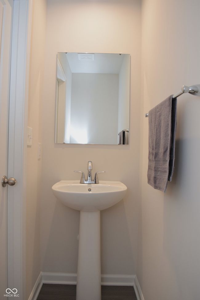 half bathroom on main floor by garage | Image 25