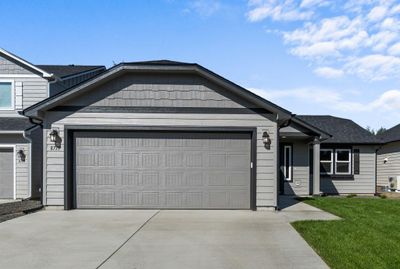 8719 N Hazelnut St, Home with 3 bedrooms, 2 bathrooms and null parking in Spokane WA | Image 1