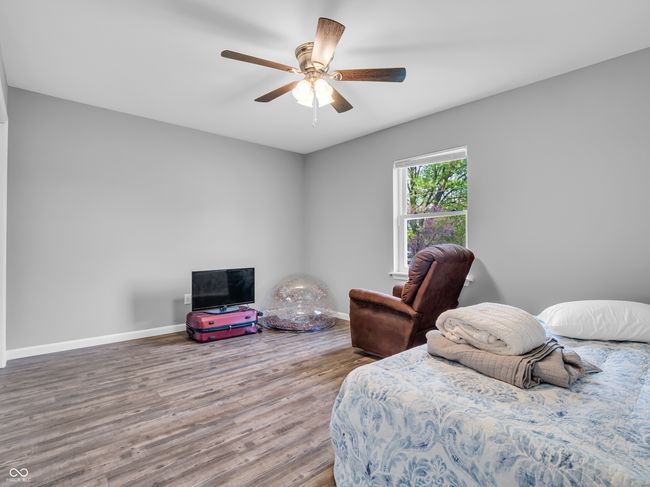 bedroom #2 featuring a ceiling fan and vinyl plank floors | Image 16