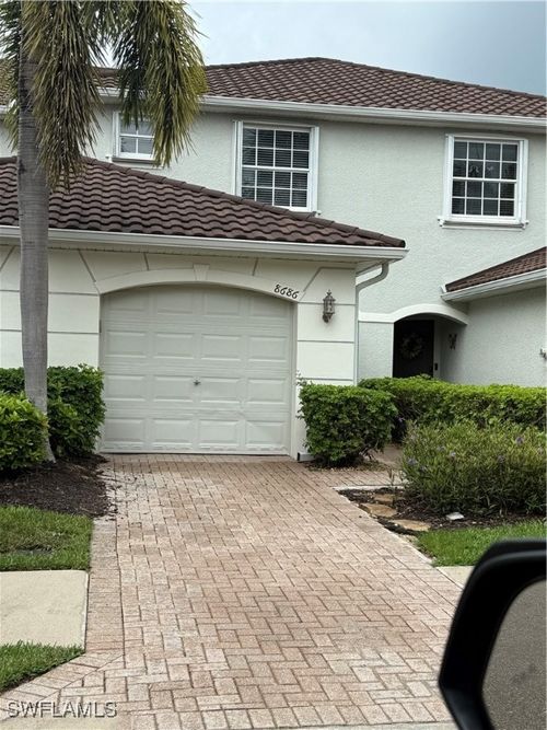 8686 Athena Ct, LEHIGH ACRES, FL, 33971-3754 | Card Image