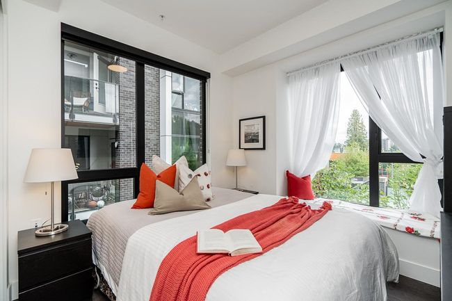 Bedroom featuring wood finished floors | Image 18