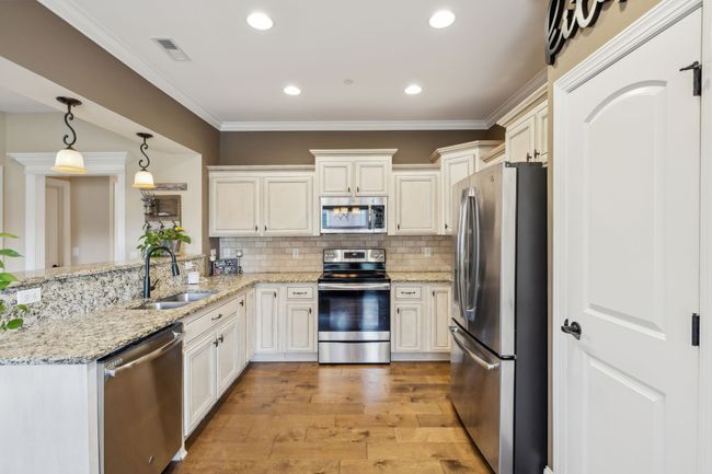 This well-appointed space is perfect for everyday cooking and special gatherings alike.1107 Sycamore Leaf Way Murfreesboro, TN 37129 | Image 11