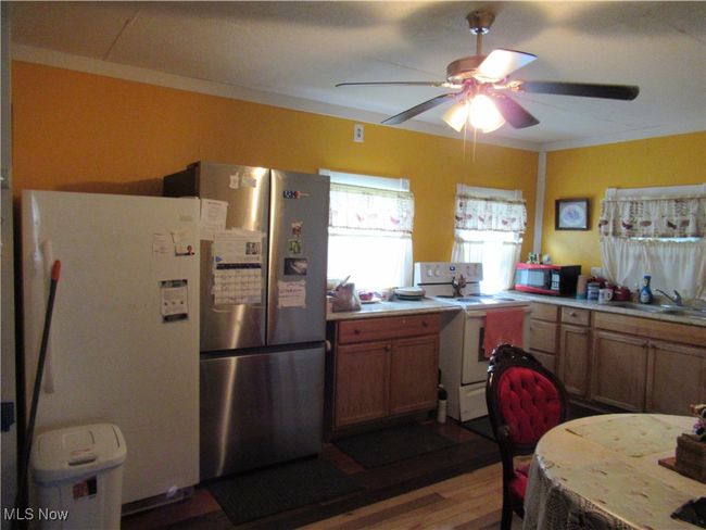 Stove, Stainless Steel Refrigerator and Freezer stay with the home | Image 7
