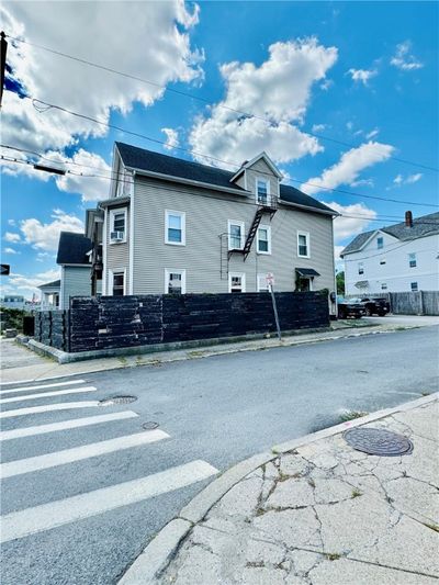 1071 Main Street, Home with 6 bedrooms, 3 bathrooms and 6 parking in Pawtucket RI | Image 3