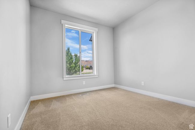 Unfurnished room featuring carpet floors and baseboards | Image 16