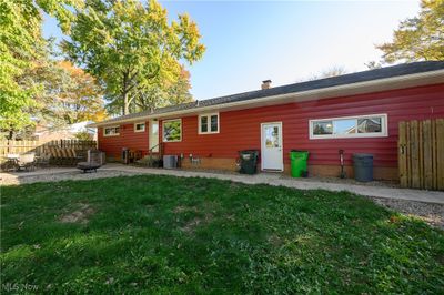 Back of house featuring a patio, a yard, and central AC unit | Image 3