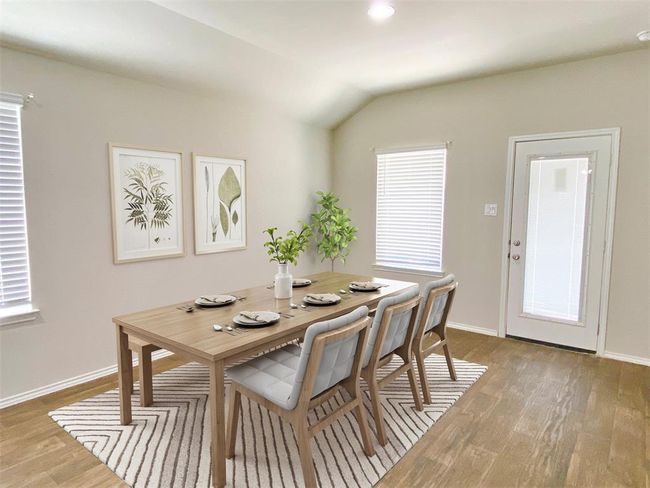 Dining, Breakfast Flex Space with natural light complimenting neutral walls and wood planked vinyl floors | Image 4