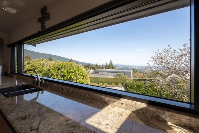 Details with a mountain view and a sink | Image 12