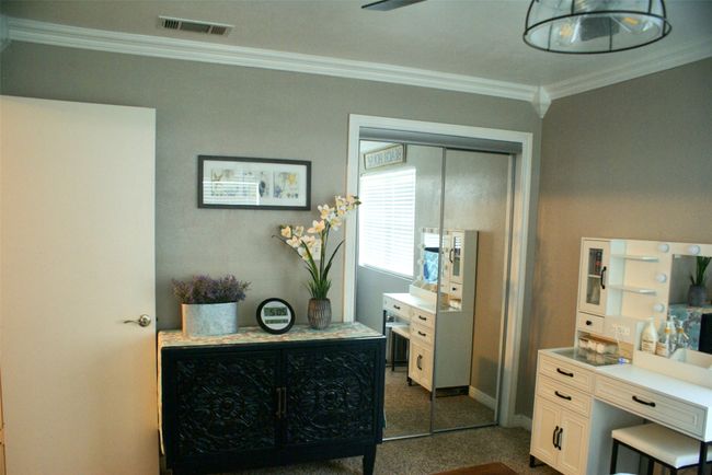 Bathroom with ornamental molding and baseboards | Image 16