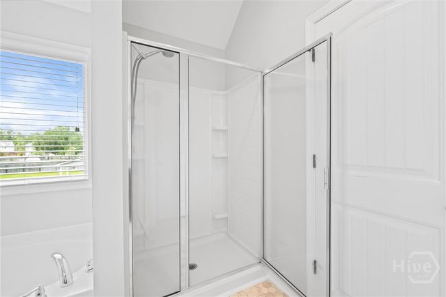 Private ensuite bath with walk in shower. | Image 24