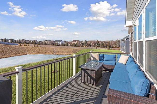 Deck looks onto a tranquility pond | Image 47