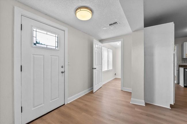 Foyer looking into Laudry room | Image 8