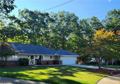 View of front of house featuring a front yard and a garage | Image 3