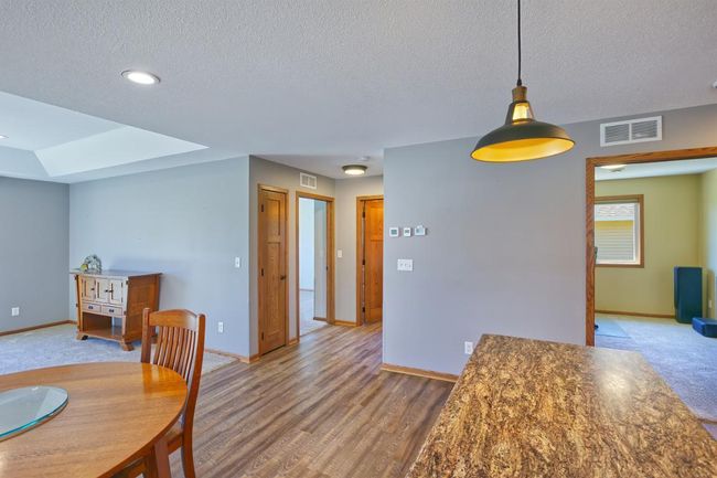 Look into both bedrooms, bathroom and linen closet | Image 14