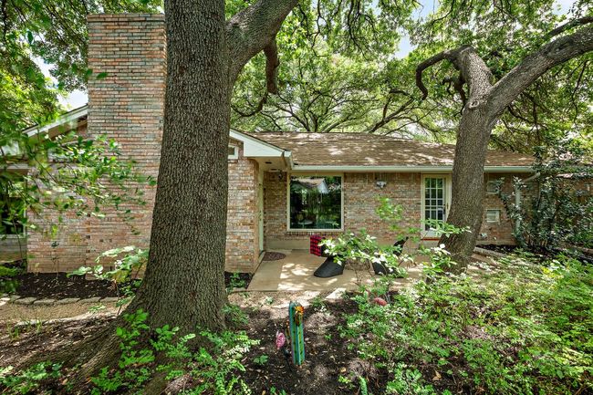 Shade from the trees helps cool the home—and cut electric bills | Image 34