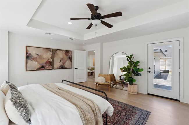 Enjoy easy access to the backyard straight from the primary bedroom. | Image 17