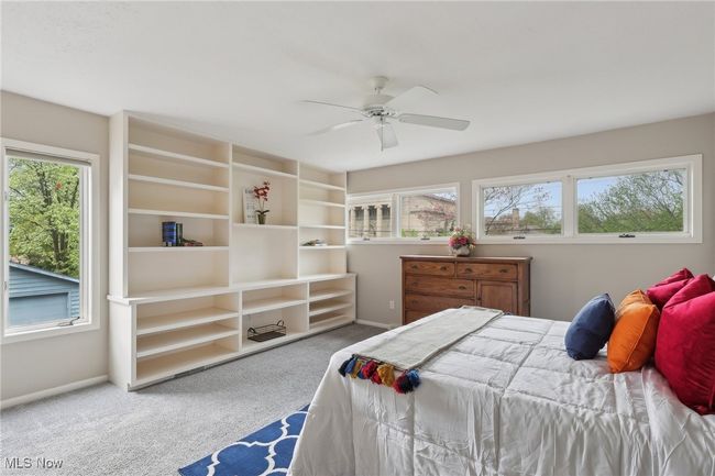 Bedroom with ceiling fan, baseboards, and carpet floors | Image 28