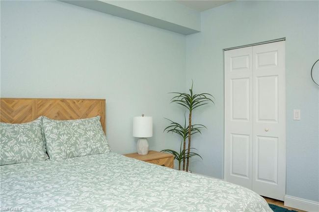 Bedroom with a closet | Image 21