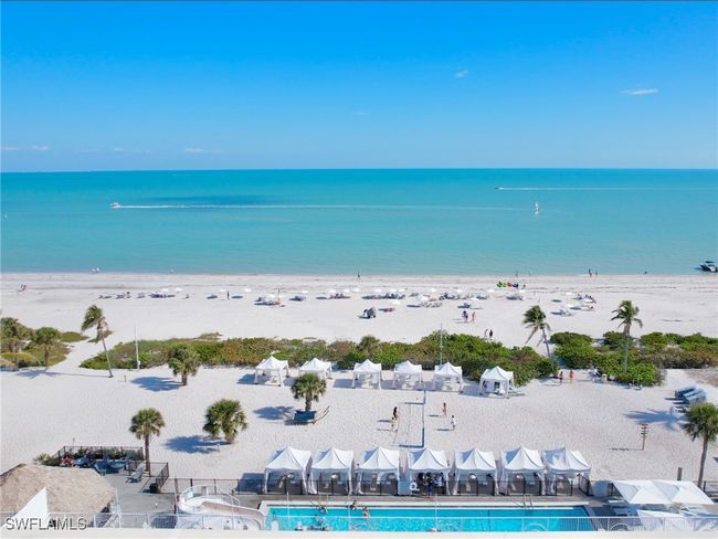 Drone / aerial view featuring a beach view and a water view | Image 33