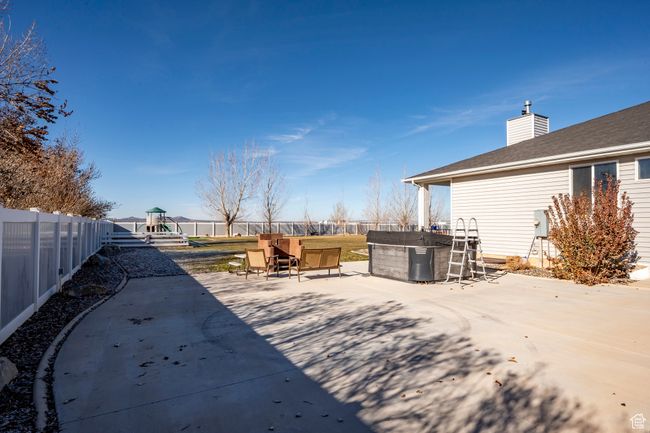 View of yard featuring a patio and a fenced backyard | Image 55