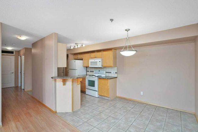 201 - 5205 Woodland Road, Home with 2 bedrooms, 1 bathrooms and 1 parking in Innisfail AB | Image 6
